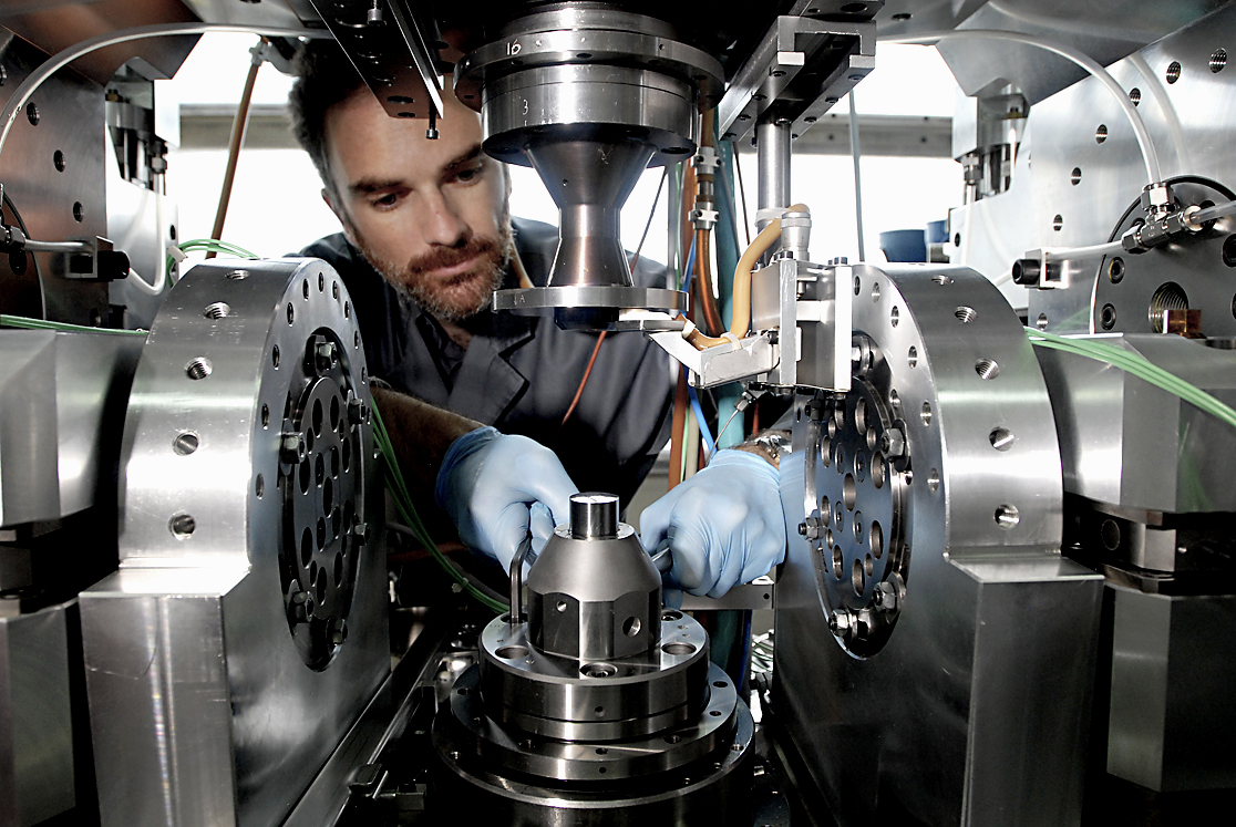 Nicolas Devaux, engineer, makes adjustments to the test machine for large size bearings at the INSA research centre in the University of Lyon, France.
Photo: Alastair Miller 15.6.2011